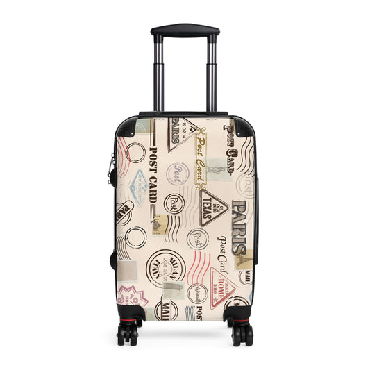 Suitcases with travel stamps on one side